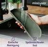 A hand holding a gray sink caddy under a running faucet. Náhľad obrázku produktu