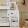 A close-up view of a white bunk bed with stairs and storage drawers. Produktbild-Vorschau