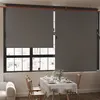 A dining table set up near a window with roller blinds. Produktbild-Vorschau