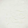 A close-up, overhead view of white cornstarch powder. Podgląd zdjęcia produktu