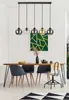 A dining room with a table, chairs, and a chandelier. Náhled obrázku produktu
