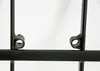 Close-up view of the connection points on a black metal wine rack. Náhled obrázku produktu