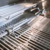 Close-up view of a rotisserie spit and forks inside a grill. Náhľad obrázku produktu