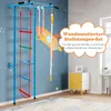 A children's climbing wall set mounted on a blue wall with a rocket decal. A small yellow and white cabinet is visible to the right. Produktbild-Vorschau