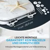 A close-up of a toilet seat with mounting hardware and text overlays. Náhled obrázku produktu