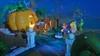Mario, Peach, and Rabbid characters in a spooky, nighttime garden setting with a large pumpkin. Produktbild-Vorschau