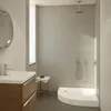 A modern bathroom with a shower and vanity. Produktbild-Vorschau