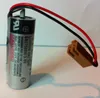 A close-up shot of a lithium battery with wires and a connector. Náhled obrázku produktu