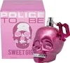 A pink glittery skull-shaped perfume bottle and its matching pink box are displayed against a white background. Anteprima dell’immagine prodotto