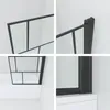 A collage of four close-up images showing details of a black framed glass shower screen for a bathtub. Produktbild-Vorschau