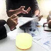 People in a meeting discussing business with a diffuser on the table. Anteprima dell’immagine prodotto