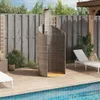 An outdoor shower next to a swimming pool on a wooden deck. Anteprima dell’immagine prodotto