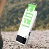A white phone case with a green strap is shown in an outdoor setting. Produktbild-Vorschau