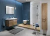 A modern bathroom with blue tiled walls, a wooden vanity, a wall-mounted toilet on a wooden platform, and a walk-in shower with white tiles. Podgląd zdjęcia produktu