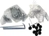 A collection of parts for a tunnel frame, including screws, nuts, stakes, rope, and caps. Voir les images du produit
