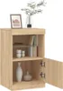 A wooden cabinet with an open door, displaying shelves with books, vases, and decorative items. Produktbild-Vorschau