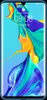 A smartphone displaying a colorful abstract wallpaper on its lock screen. Voir les images du produit