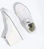 A pair of white Vans Sk8-hi Tapered sneakers are shown from a top-down diagonal angle on a white background. Produktbild-Vorschau