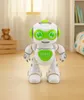 A white and green robot toy is standing on a wooden floor in a room with soft lighting. Anteprima dell’immagine prodotto