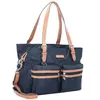 A navy blue tote bag with tan leather accents and straps, shown against a white background. Voir les images du produit