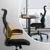 A black ergonomic office chair is shown in a split image. One part shows a close-up of the chair's adjustable backrest with an orange overlay highlighting the range of motion. The other part shows the chair in a modern office setting next to a standing des Podgląd zdjęcia produktu