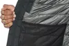 A close-up view of the inside of a jacket, showing a hand reaching into a mesh pocket. Produktbild-Vorschau