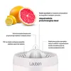 A white electric citrus juicer with a grapefruit and lemons shown above, along with descriptive text and diagrams. Podgląd zdjęcia produktu