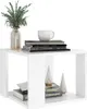 A white side table with books, a plant, and decorative items on it. Produktbild-Vorschau