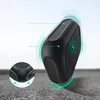 A black accessory, possibly a charger or case, is shown on a textured surface with a light blue and white gradient background. Green circular graphics suggest functionality or charging. Anteprima dell’immagine prodotto