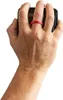 A hand holding a smartphone with a red ring on one finger. Anteprima dell’immagine prodotto
