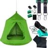A green hanging tent-like swing for children and its accessories are displayed against a white background. Produktbild-Vorschau