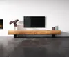 A modern living room with a TV stand and a television mounted on the wall. Produktbild-Vorschau