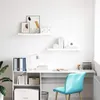 A clean, modern home office setup with a desk, chair, and shelving unit. Produktbild-Vorschau
