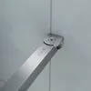 Close-up of a metal hinge mechanism attached to a wall. Produktbild-Vorschau