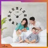 A family is posing in front of a large wall clock. Náhled obrázku produktu