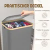 A hand is shown opening the lid of a gray laundry basket filled with clothes. Text overlays describe features. Voir les images du produit