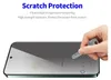 A hand is holding a key to demonstrate the scratch resistance of a phone screen protector. Produktbild-Vorschau