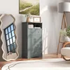A room with a cabinet, mirror, and lamp. Náhled obrázku produktu