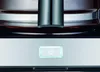 A close-up of a coffee machine's control panel and carafe. Produktbild-Vorschau