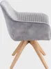 A side view of a gray fabric chair with wooden legs. Podgląd zdjęcia produktu