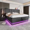 A modern bedroom with a large upholstered bed featuring LED lighting. Produktbild-Vorschau
