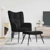 A black velvet armchair and ottoman are shown in a living room setting. Voir les images du produit
