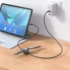 A tablet, a smartwatch, and a charger are shown on a wooden desk, connected by cables. Podgląd zdjęcia produktu