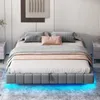 A modern bedroom with a bed featuring LED lighting. Produktbild-Vorschau
