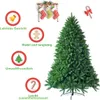 A large artificial Christmas tree is shown with several feature callouts and Christmas decorations. Voir les images du produit