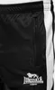 A close-up view of the lower part of black track pants with a white stripe down the side and a Lonsdale London logo. Anteprima dell’immagine prodotto