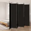 A black room divider is set up in a bedroom next to a bed. Náhled obrázku produktu