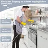 A man is cleaning a kitchen stove with a steam cleaner. Náhľad obrázku produktu
