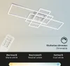 A modern LED ceiling light with a geometric design, shown with a remote control and color temperature options. Anteprima dell’immagine prodotto