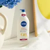 NIVEA Q10 Straffende und Pflegende Körperlotion für Produktbild-Vorschau 4